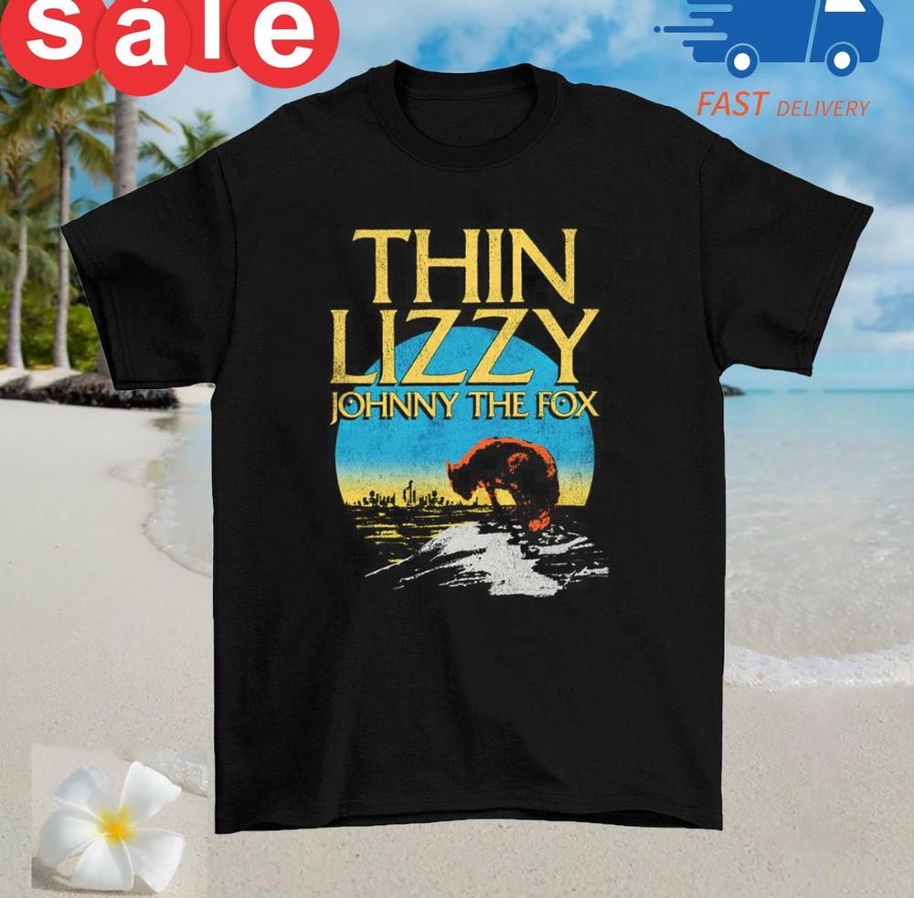 Thin Lizzy Johnny The Fox Sun Black T Shirt Cotton Adult Tee S To 4XL Unisex T-Shirt XXXL
Thin Lizzy Johnny The Fox Sun Black T Shirt Cotton Adult Tee S To 4XL Unisex T-Shirt XXXL