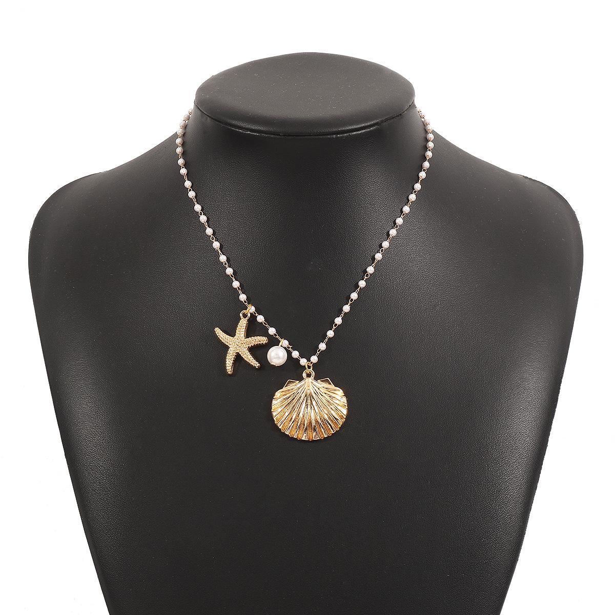 Легкое роскошное металлическое ожерелье для женщин с морским элементом, гребешком, морской звездой, жемчужной цепочкой на ключицу, винтажные ювелирные аксессуары в стиле OL золотой
Легкое роскошное металлическое ожерелье для женщин с морским элементом, гребешком, морской звездой, жемчужной цепочкой на ключицу, винтажные ювелирные аксессуары в стиле OL золотой
