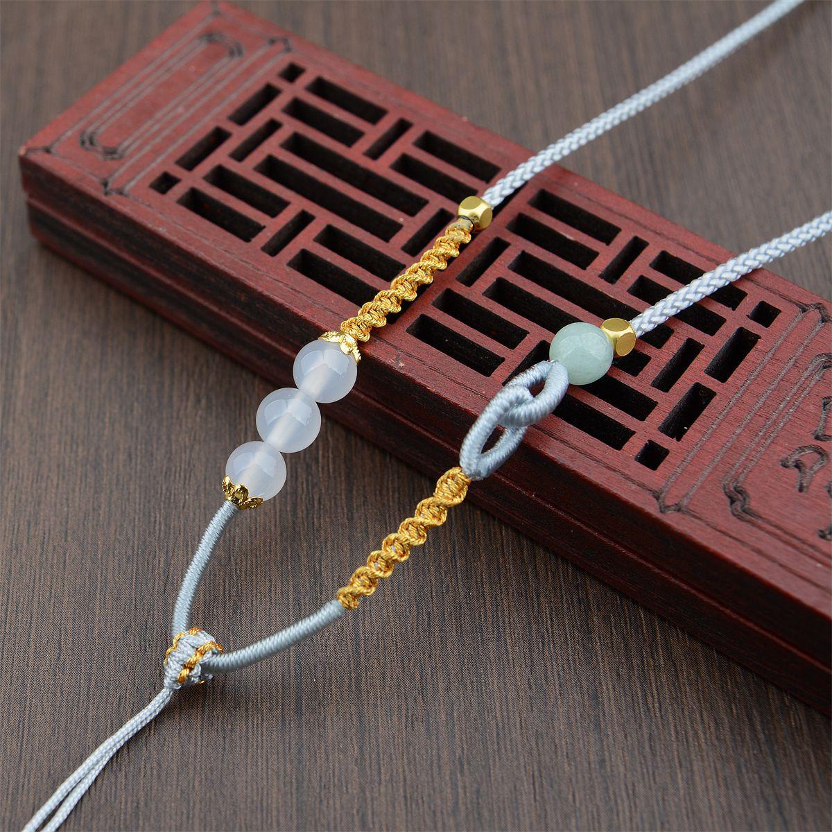 Handcrafted Asymmetrical Ethnic Pendant Necklace with Gold Thread
Handcrafted Asymmetrical Ethnic Pendant Necklace with Gold Thread
