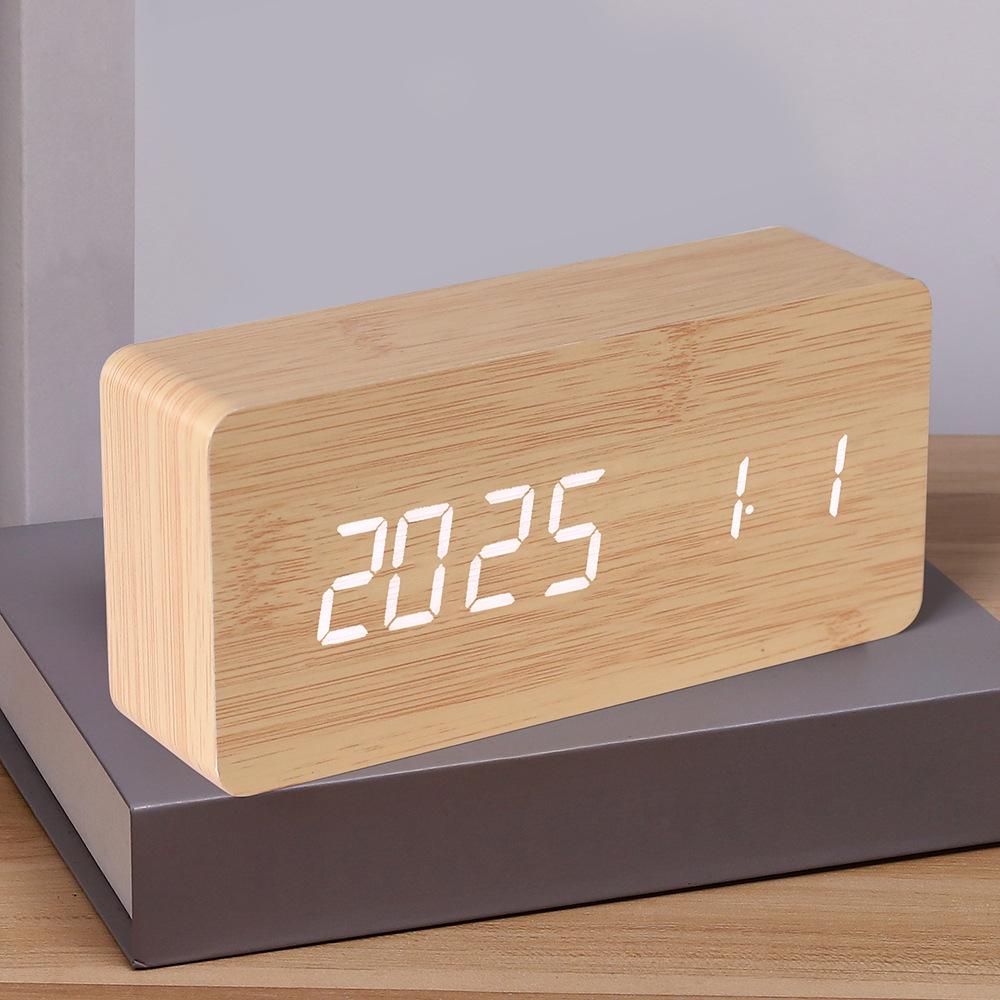 Minimalist LED Wooden Clock: Smart USB-Powered Alarm & Digital Display for Bedside or Desk.
Minimalist LED Wooden Clock: Smart USB-Powered Alarm & Digital Display for Bedside or Desk.