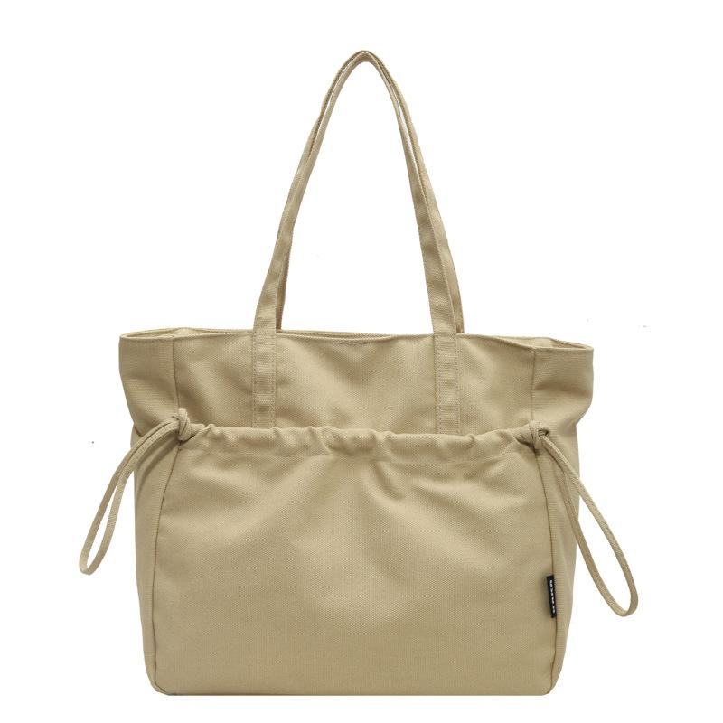 Lightweight large-capacity casual tote bag, fashionable drawstring, simple women s shoulder bag, college student class handbag one size fits all хакі
Lightweight large-capacity casual tote bag, fashionable drawstring, simple women s shoulder bag, college student class handbag one size fits all хакі