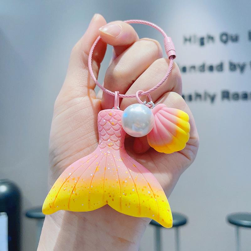 Creative Gradient Pearl Mermaid Tail Keychain - Elegant Car Keyring & Women s Bag Pendant Gift
Creative Gradient Pearl Mermaid Tail Keychain - Elegant Car Keyring & Women s Bag Pendant Gift