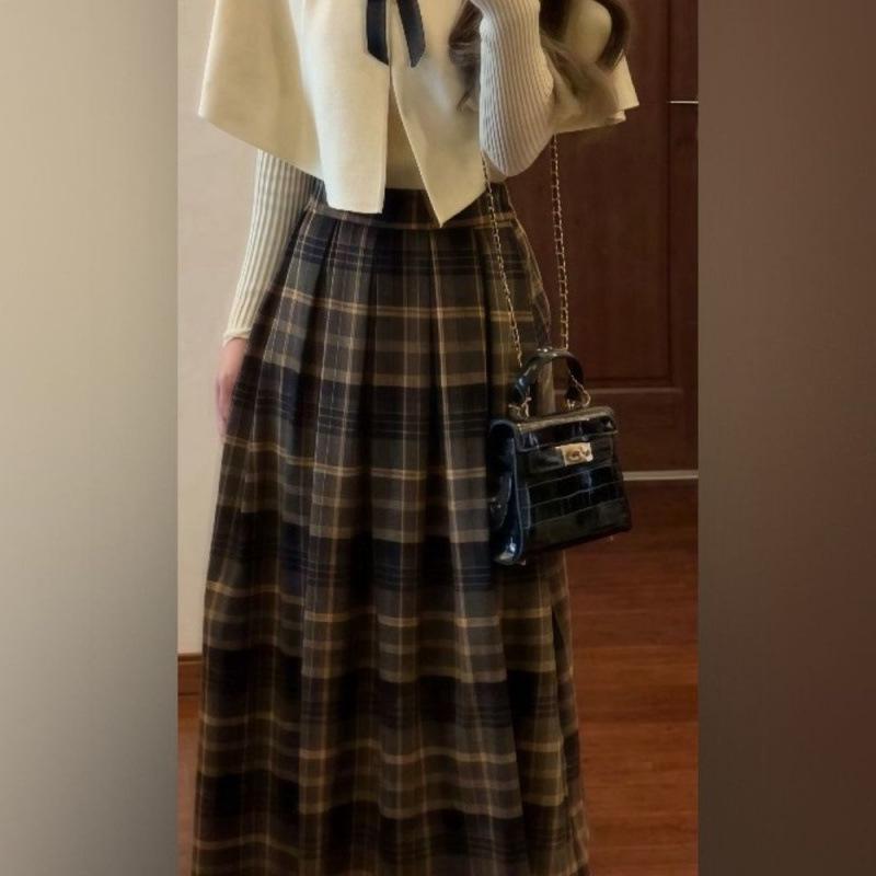 Осенне-зимний комплект из двух частей в стиле светской львицы из майлара: Накидка и клетчатая миди-юбка с высокой талией M (Recommended 50-55 kg)
Осенне-зимний комплект из двух частей в стиле светской львицы из майлара: Накидка и клетчатая миди-юбка с высокой талией M (Recommended 50-55 kg)