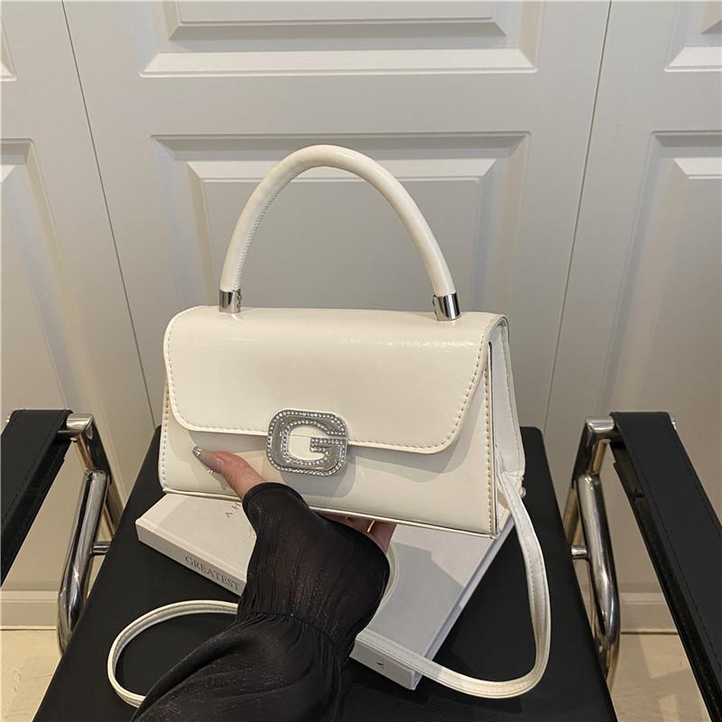 Premium handbag bag women s new popular shoulder bag fashion versatile commuter messenger small square bag белый
Premium handbag bag women s new popular shoulder bag fashion versatile commuter messenger small square bag белый