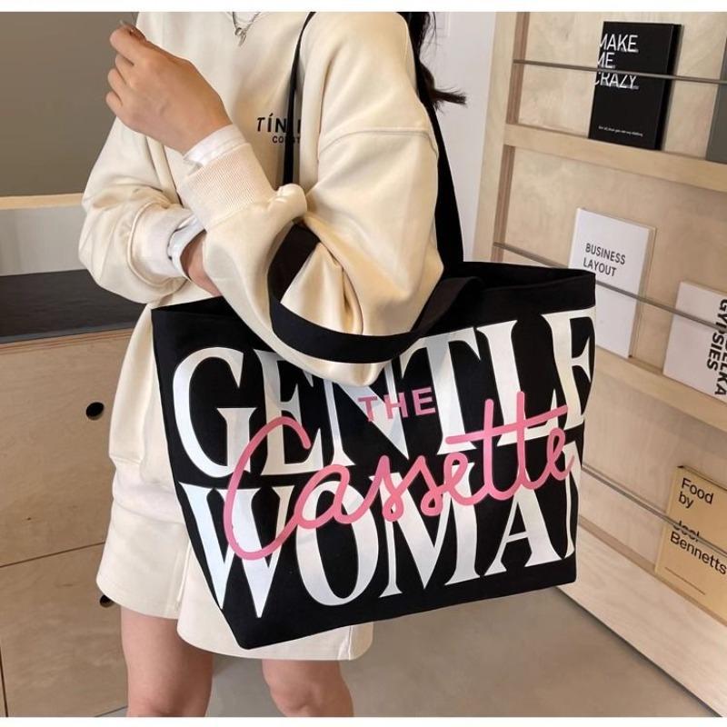 Korean niche canvas bag women s new fashionable largecapacity tote bag letter shoulder class tote bag
Korean niche canvas bag women s new fashionable largecapacity tote bag letter shoulder class tote bag