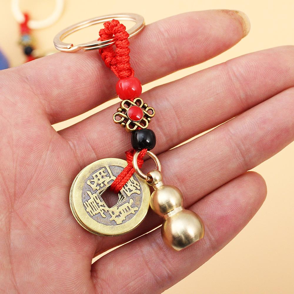 Openable Brass Gourd Keychain with Five Emperors Coins
Openable Brass Gourd Keychain with Five Emperors Coins