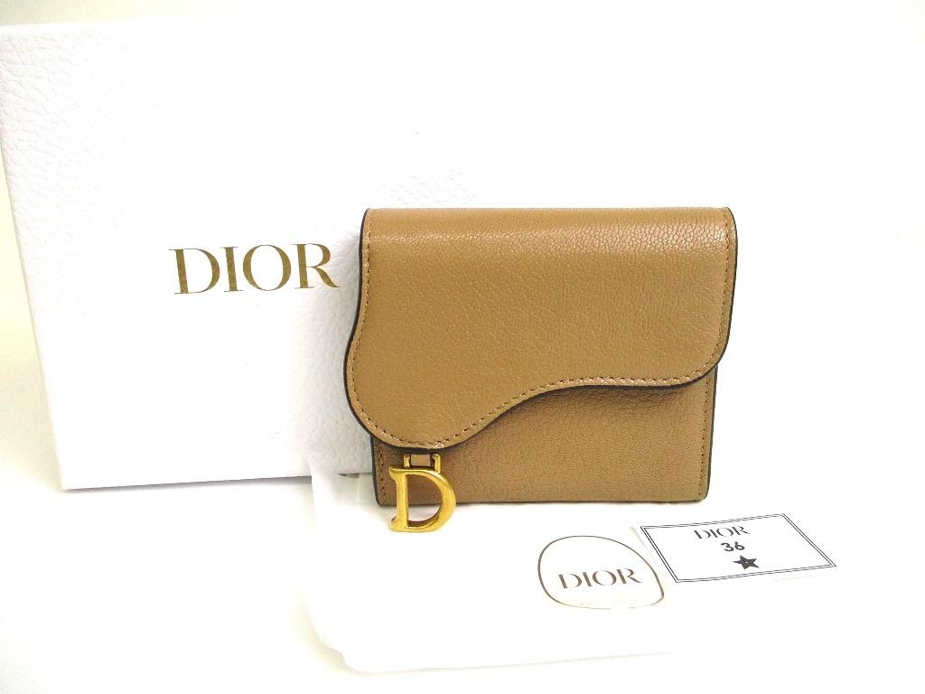Автентичний коричневий шкіряний гаманець Christian Dior Cannage Trifold Saddle Lotus №a610 Refurbished
Автентичний коричневий шкіряний гаманець Christian Dior Cannage Trifold Saddle Lotus №a610 Refurbished