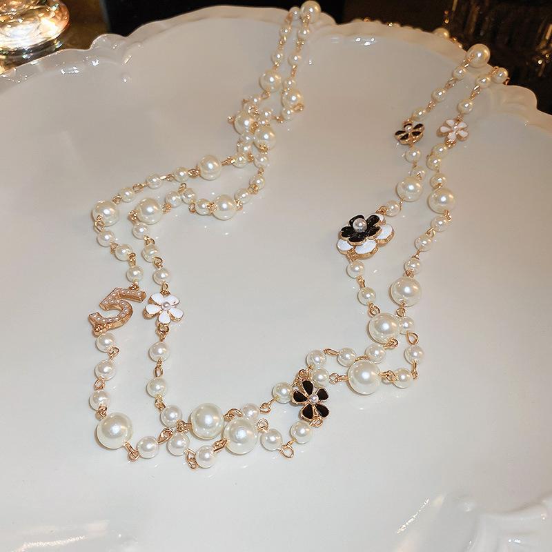 French Digital Flower Round Pearl Long Necklace Elegant Temperament Necklace Sweater Chain
French Digital Flower Round Pearl Long Necklace Elegant Temperament Necklace Sweater Chain