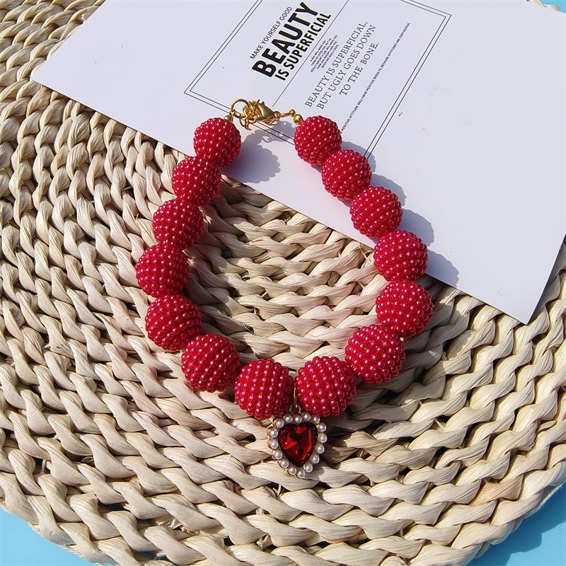 Japanese and Korean style fashion imitation pearl bayberry ball beaded dog collar cute puppy cat pet decorative accessories XS 15-20CM красный
Japanese and Korean style fashion imitation pearl bayberry ball beaded dog collar cute puppy cat pet decorative accessories XS 15-20CM красный