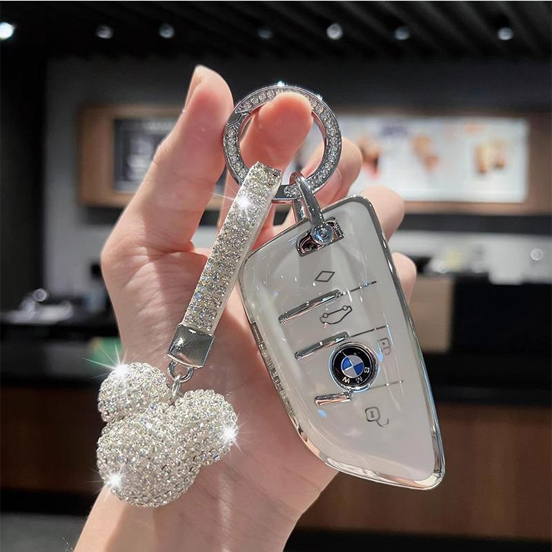 BMW Car Key Cover for 1, 3, 5, 7 Series and X1-X6, compatible with 320Li, 530Li models. Stylish shell bag for your car keys.
BMW Car Key Cover for 1, 3, 5, 7 Series and X1-X6, compatible with 320Li, 530Li models. Stylish shell bag for your car keys.