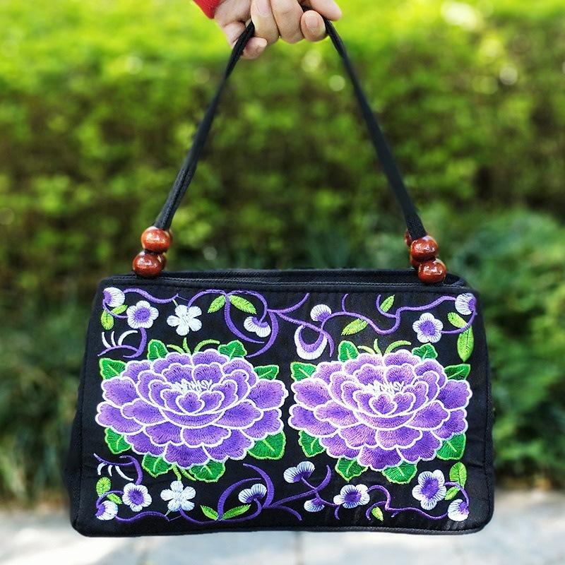 Ethnic Double-sided Embroidered Handbag with Wooden Bead Decor, Double Layer Zipper Canvas Bag, Portable Phone Wallet for Women 27x18x10
Ethnic Double-sided Embroidered Handbag with Wooden Bead Decor, Double Layer Zipper Canvas Bag, Portable Phone Wallet for Women 27x18x10