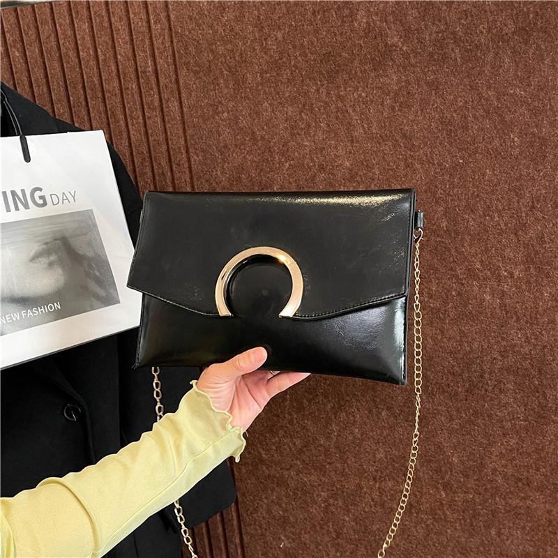 Женский повседневный клатч-конверт 225 Новый глянцевый декор в виде луны Модная цепочка Одно плечо На косу Подмышечная сумка Женский чёрный
Женский повседневный клатч-конверт 225 Новый глянцевый декор в виде луны Модная цепочка Одно плечо На косу Подмышечная сумка Женский чёрный