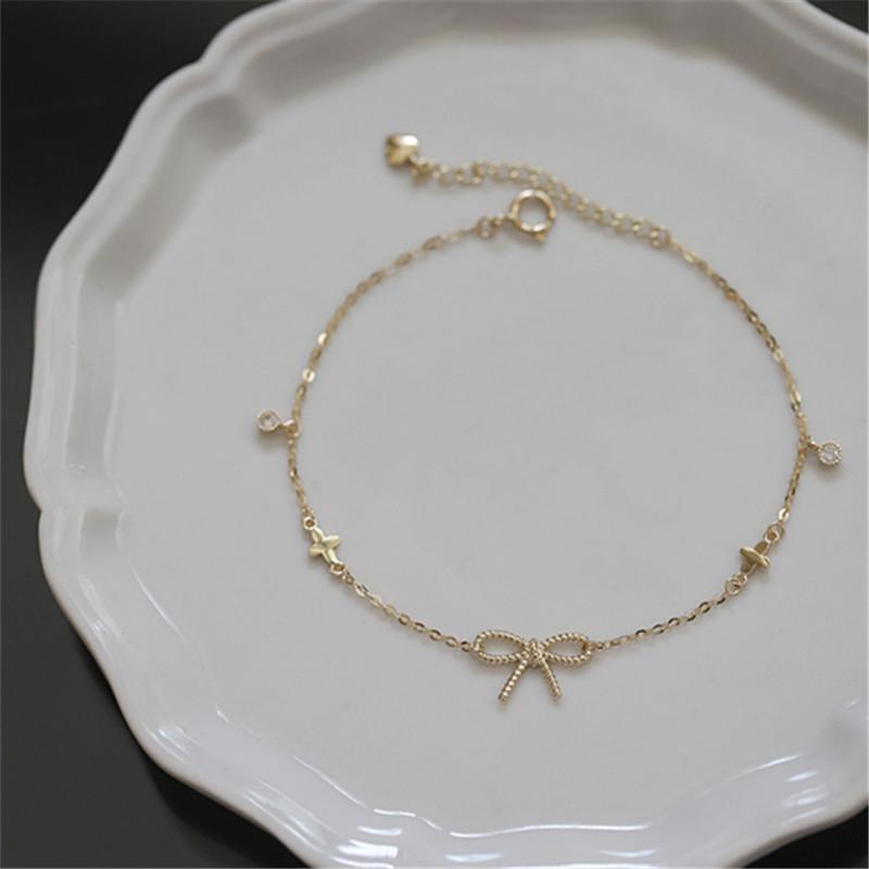 925 Sterling Silver 14K Gold Plated Zircon Bracelet for Women Simple Temperament Twist Bow Star Bracelet Jewelry 15 3cm&Gold
925 Sterling Silver 14K Gold Plated Zircon Bracelet for Women Simple Temperament Twist Bow Star Bracelet Jewelry 15 3cm&Gold