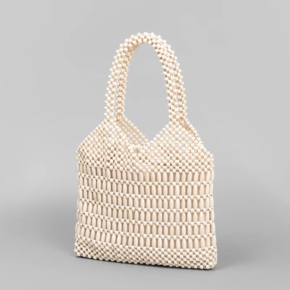 Fashion Hand-knitted Hollw Out Clutch Bead Woven Purse and Handbags Vintage Patchwork Shoulder Bag Female Summer Beach Totes Sac 30x3x30cm молочный белый
Fashion Hand-knitted Hollw Out Clutch Bead Woven Purse and Handbags Vintage Patchwork Shoulder Bag Female Summer Beach Totes Sac 30x3x30cm молочный белый