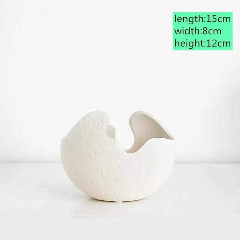 1Pcs Modern pastoral Nordic style White ceramics Egg Shell vase flower pot home desktop ornaments flower arrangement decoration
1Pcs Modern pastoral Nordic style White ceramics Egg Shell vase flower pot home desktop ornaments flower arrangement decoration