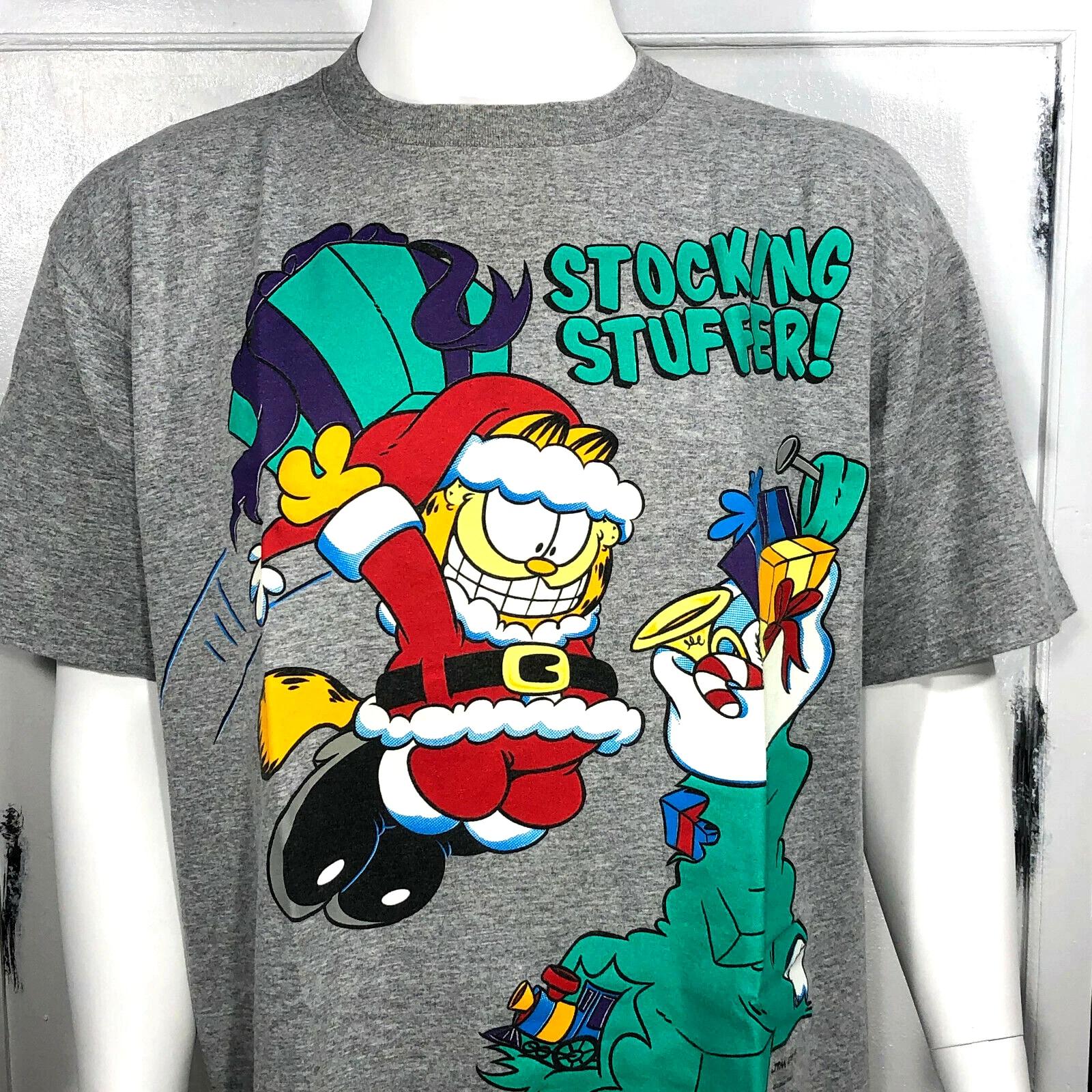 Garfield Cartoon T Shirt Vintage 1994 Stocking Stuffer Jim Davis Size XL S
Garfield Cartoon T Shirt Vintage 1994 Stocking Stuffer Jim Davis Size XL S