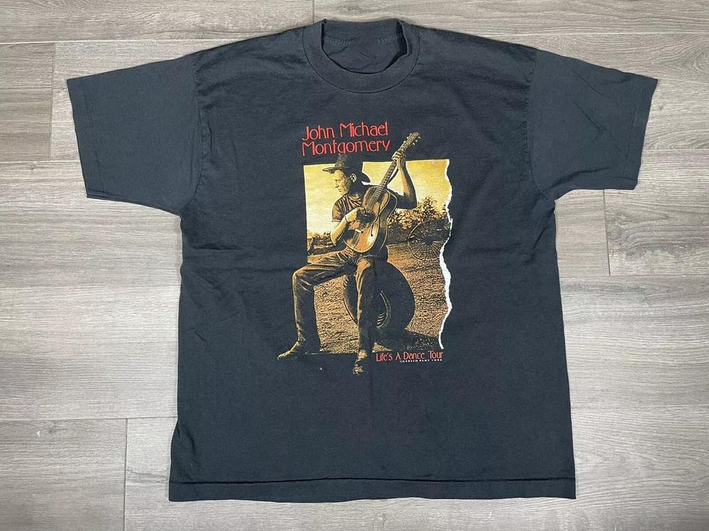 John Michael Montgomery Life s A Dance Tour Shirt Black Unisex S-5XL Unisex T-Shirt L
John Michael Montgomery Life s A Dance Tour Shirt Black Unisex S-5XL Unisex T-Shirt L