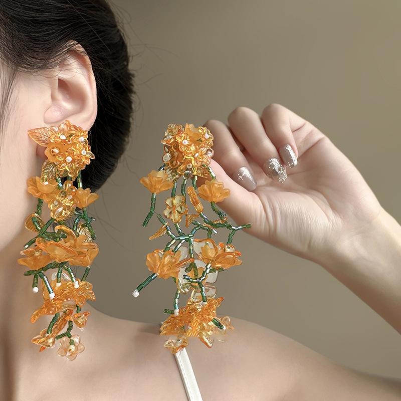 Yellow acrylic glass beads flower fringed earrings fashionable fresh studs sweet versatile earrings
Yellow acrylic glass beads flower fringed earrings fashionable fresh studs sweet versatile earrings