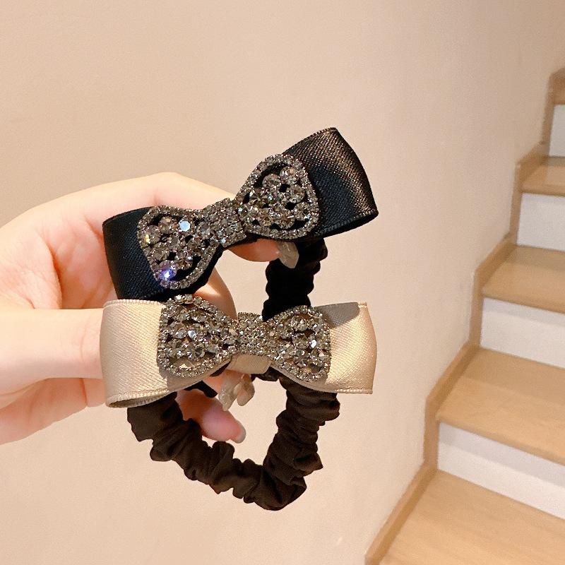 Bow tie rhinestone hair tie high-end hair tie black temperament ball hair accessories small intestine circle hair tie
Bow tie rhinestone hair tie high-end hair tie black temperament ball hair accessories small intestine circle hair tie
