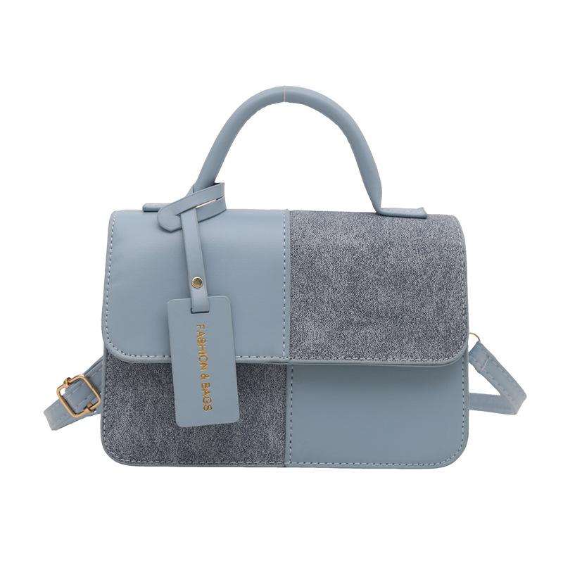 Winter splicing texture trendy messenger bag small square bag commuting shoulder popular fashion foreign style handbag this year синій
Winter splicing texture trendy messenger bag small square bag commuting shoulder popular fashion foreign style handbag this year синій