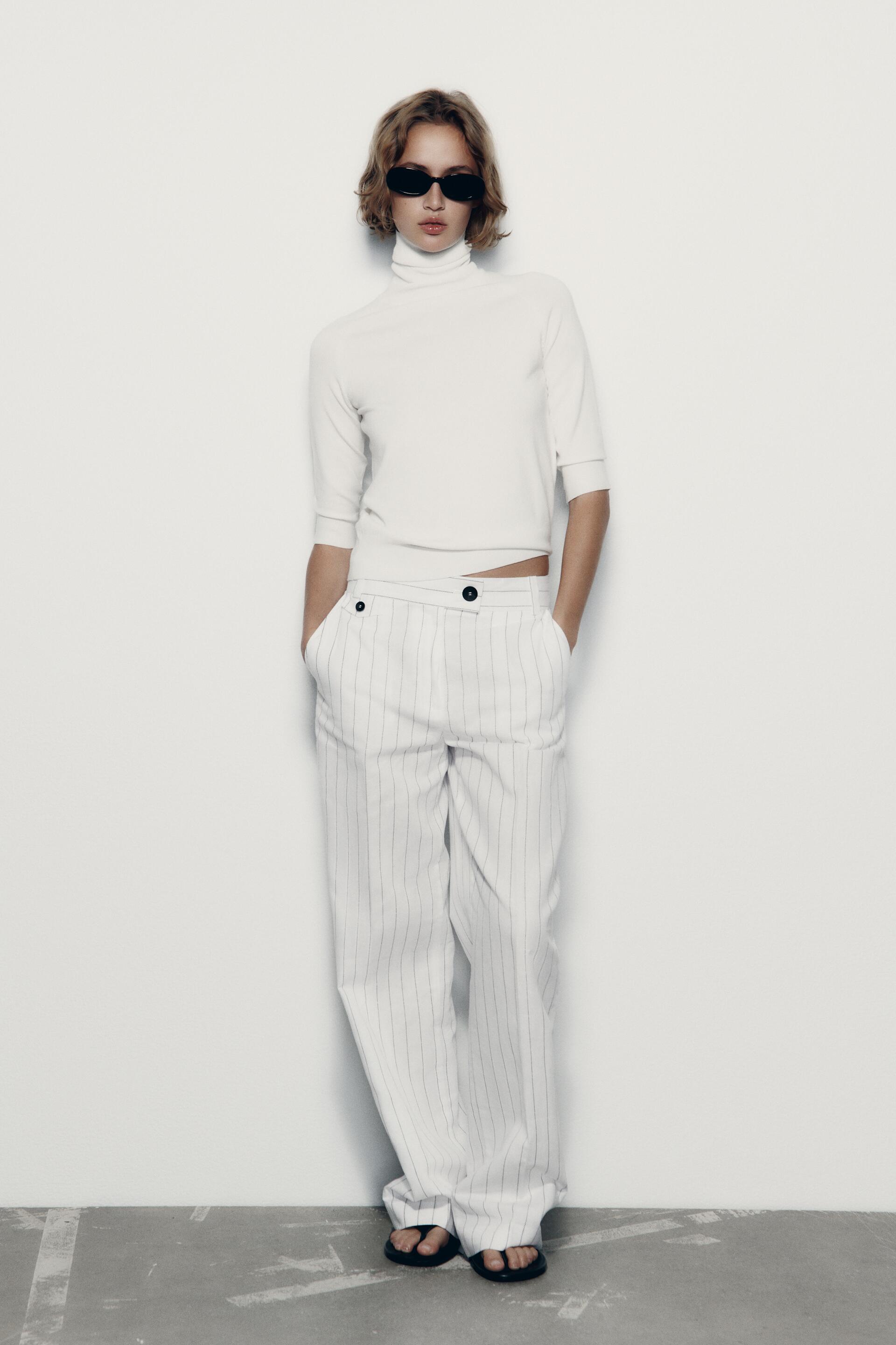 PINSTRIPED TROUSERS 
PINSTRIPED TROUSERS