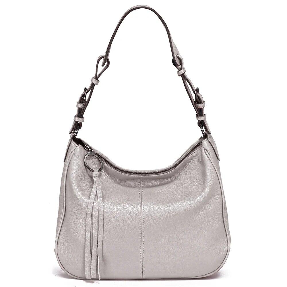 Zency Новая черная, бежевая сумка-хобо из натуральной кожи, женская простая классическая повседневная сумка через плечо, мягкая сумка через плечо с большими карманами светло-серый
Zency Новая черная, бежевая сумка-хобо из натуральной кожи, женская простая классическая повседневная сумка через плечо, мягкая сумка через плечо с большими карманами светло-серый