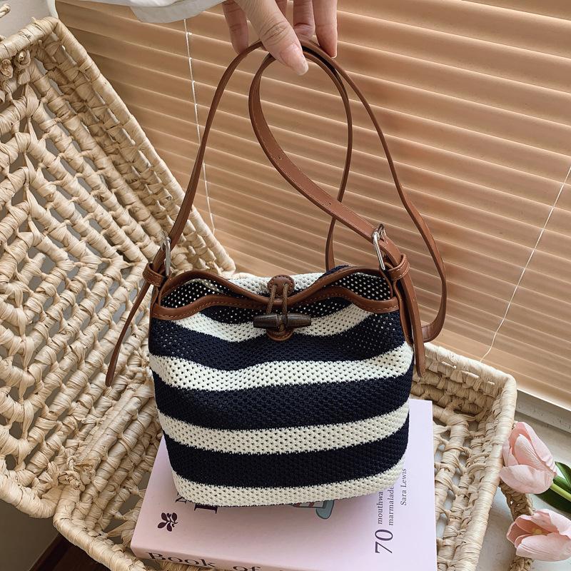 Summer versatile bags, mother and child bags, niche seaside bags, raffia woven bags, single shoulder underarm women s bags темно-синього кольору
Summer versatile bags, mother and child bags, niche seaside bags, raffia woven bags, single shoulder underarm women s bags темно-синього кольору