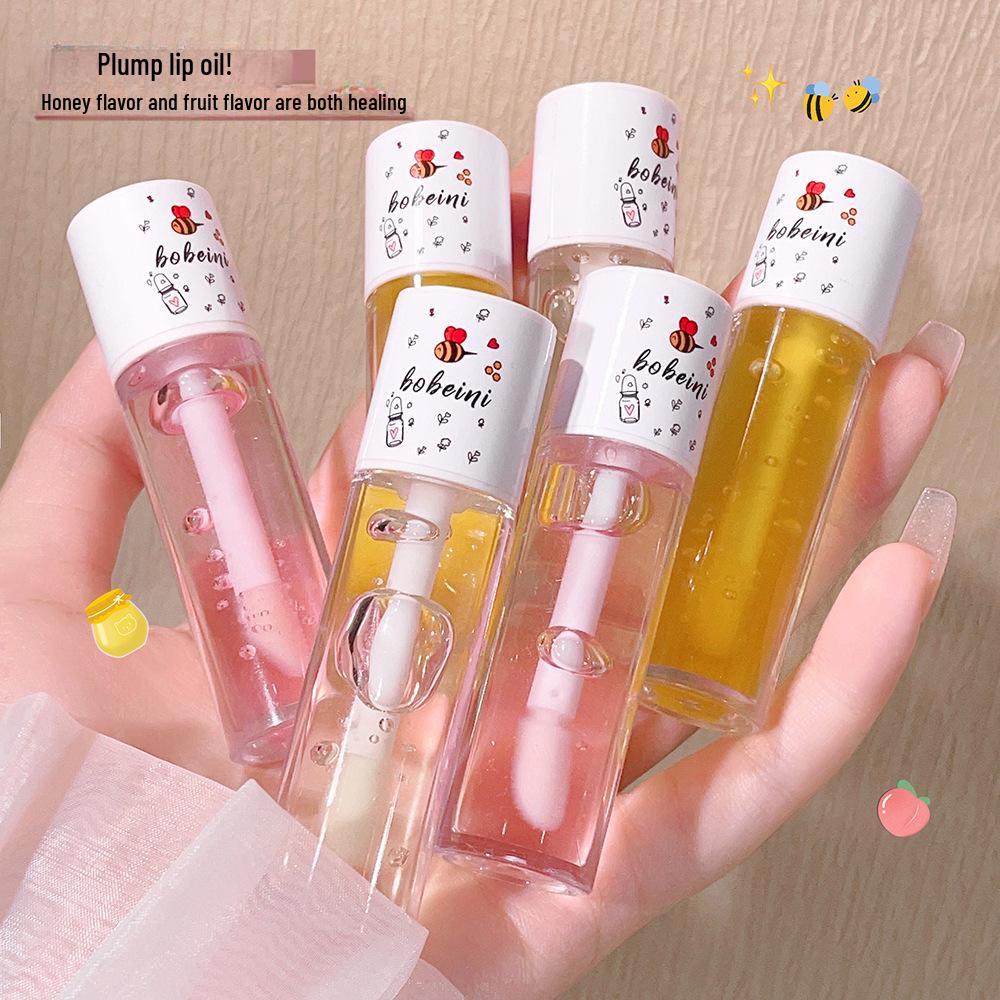 Bee Lip Oil: Hydrating Lip Care for Dry, Cracked Lips - Transparent Glossy Finish and Nourishing Honey Formula 03
Bee Lip Oil: Hydrating Lip Care for Dry, Cracked Lips - Transparent Glossy Finish and Nourishing Honey Formula 03