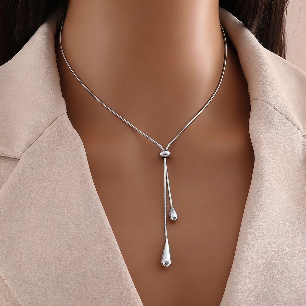 Minimalist Gold Teardrop Tassel Earring And Necklace Set Long Chain Elegant Cool Tone Fashion Jewelry For Women
Minimalist Gold Teardrop Tassel Earring And Necklace Set Long Chain Elegant Cool Tone Fashion Jewelry For Women