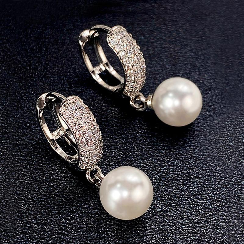 Huitan Temperament Elegant Simulated Pearl Dangle Earrings for Women Simple Stylish Design Delicate Accessories Fashion Zircon
Huitan Temperament Elegant Simulated Pearl Dangle Earrings for Women Simple Stylish Design Delicate Accessories Fashion Zircon