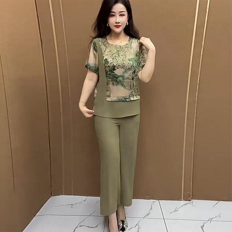 Trendy 2025 Plus Size Summer Two-Piece Set: Slimming Short-Sleeve Top & Wide-Leg Pants for Middle-Aged Women 2XL (130-145 kg)
Trendy 2025 Plus Size Summer Two-Piece Set: Slimming Short-Sleeve Top & Wide-Leg Pants for Middle-Aged Women 2XL (130-145 kg)