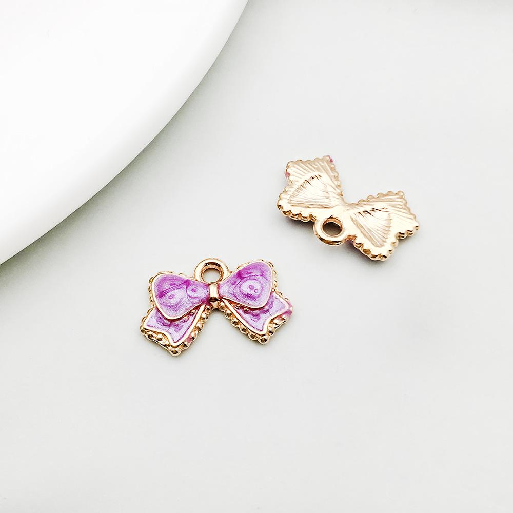 New Colorful Drip Oil Alloy Bow Charm Pendant
New Colorful Drip Oil Alloy Bow Charm Pendant