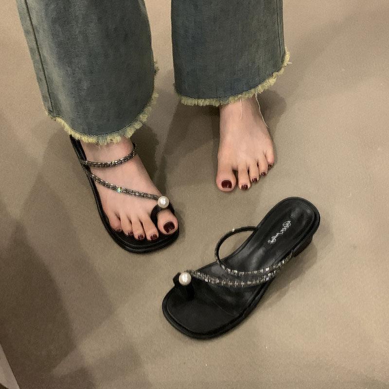 Rhinestone vacation toe sandals with skirt women s outer wear 2025 new fairy style thick heel set toe pearl cool slippers 35 чорний
Rhinestone vacation toe sandals with skirt women s outer wear 2025 new fairy style thick heel set toe pearl cool slippers 35 чорний