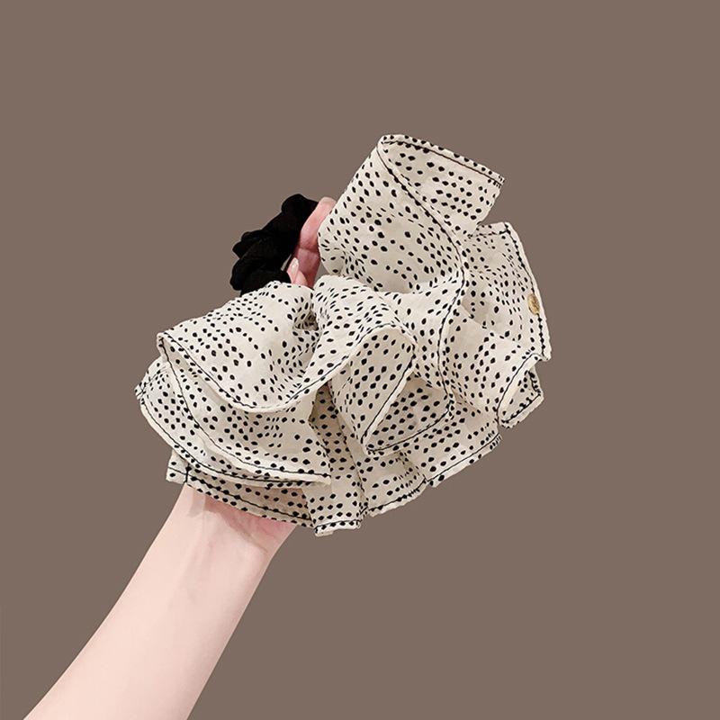 Fabric bow polka dot large intestine hair band Korean niche light luxury fashion versatile high sense back head hair accessories women
Fabric bow polka dot large intestine hair band Korean niche light luxury fashion versatile high sense back head hair accessories women