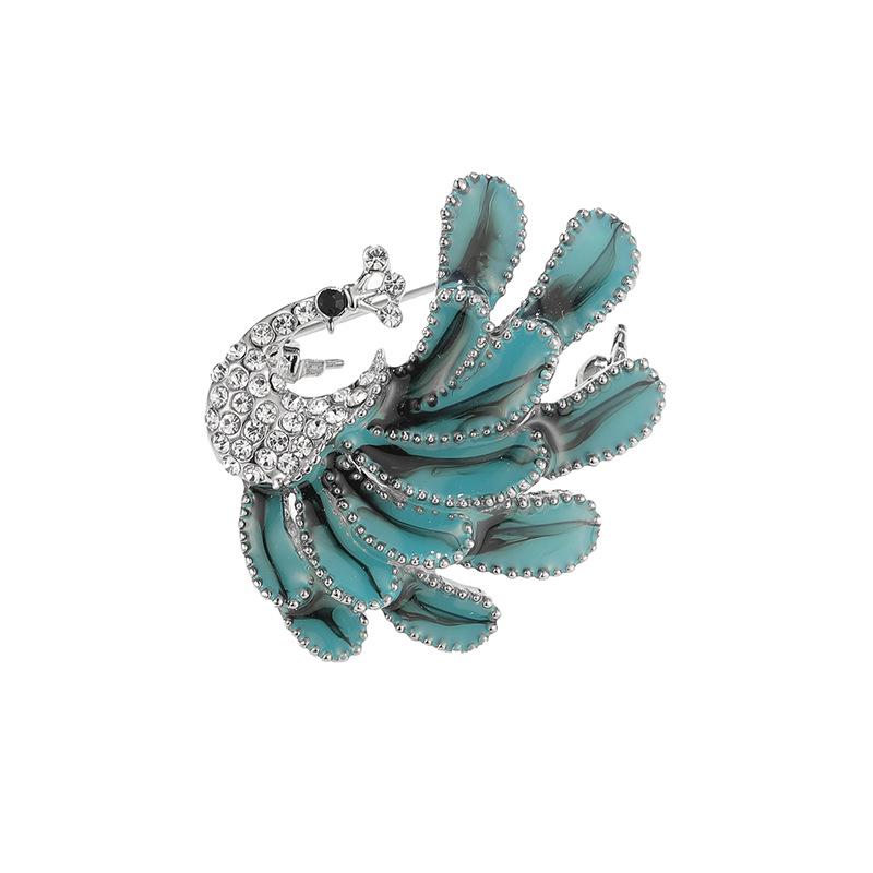 Брошь Павлин Дили Сюэ: Модная брошь с бриллиантами и эмалью
Брошь Павлин Дили Сюэ: Модная брошь с бриллиантами и эмалью