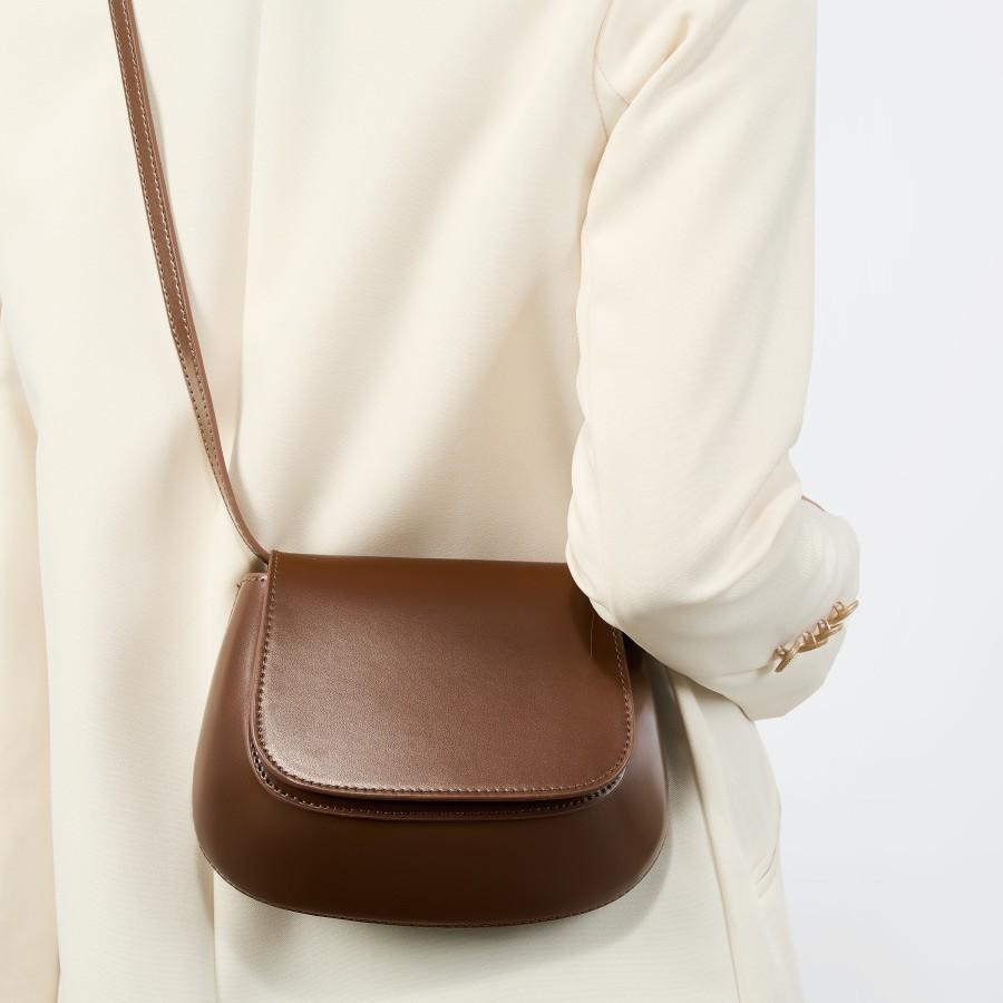 Niche Fashion Shoulder Women s Bag New Bag Texture Messenger Bag темно-коричневого кольору
Niche Fashion Shoulder Women s Bag New Bag Texture Messenger Bag темно-коричневого кольору