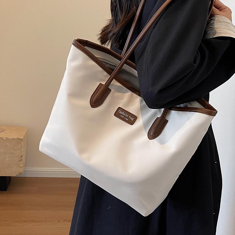 Oxford cloth bag women s large-capacity new casual versatile shoulder bag cloth bag premium tote bag чорний
Oxford cloth bag women s large-capacity new casual versatile shoulder bag cloth bag premium tote bag чорний