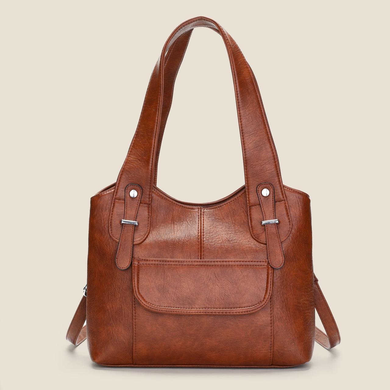 Autumn and winter new women s casual shoulder tote bag classic high-end texture large-capacity PU handbag commute коричневий
Autumn and winter new women s casual shoulder tote bag classic high-end texture large-capacity PU handbag commute коричневий
