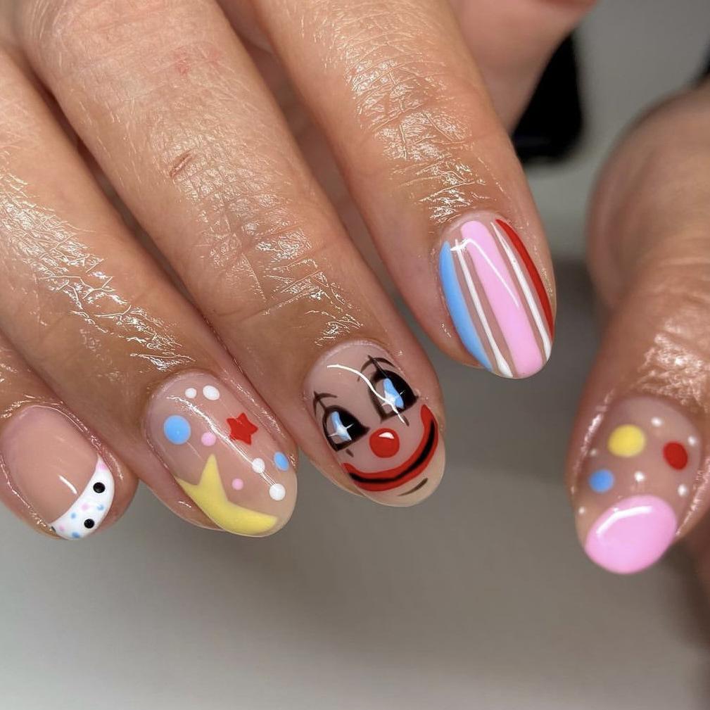 Glossy Almond Press-On Nails with Smiley, Crying Face, Clown, Stars, and French Stripes (24 Pieces)
Glossy Almond Press-On Nails with Smiley, Crying Face, Clown, Stars, and French Stripes (24 Pieces)
