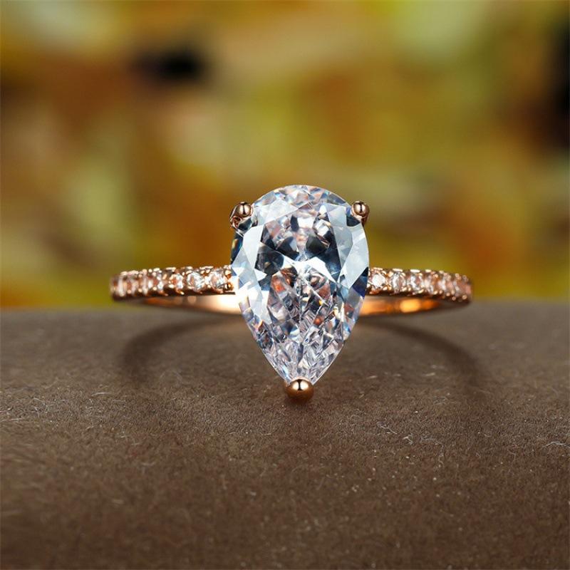 New pear-shaped cut sparkling zircon eight hearts eight arrows rose gold wedding engagement ring women no. 6 розового золота
New pear-shaped cut sparkling zircon eight hearts eight arrows rose gold wedding engagement ring women no. 6 розового золота