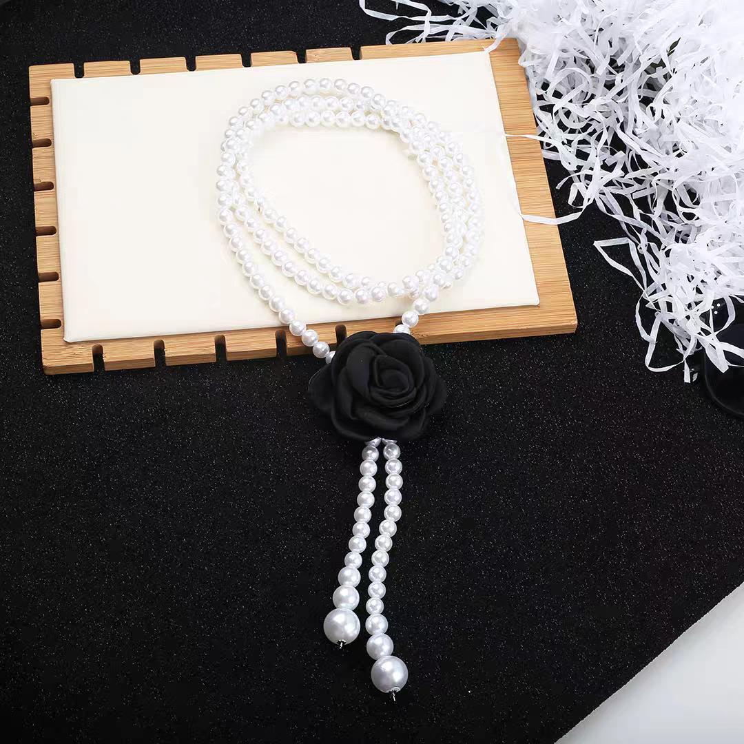 Korean Hepburn Style Camellia Pearl Waist Chain Black And White Flower Belt Decorative Dress With Skirt Xiaoxiangfeng
Korean Hepburn Style Camellia Pearl Waist Chain Black And White Flower Belt Decorative Dress With Skirt Xiaoxiangfeng