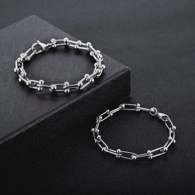 Trendy Cuban Link Bracelet: Men s & Women s Luxury U-Shaped Lock Design for High Street Hip-Hop Style.
Trendy Cuban Link Bracelet: Men s & Women s Luxury U-Shaped Lock Design for High Street Hip-Hop Style.