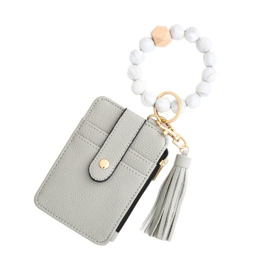 Богемный стиль брелок-кошелек с бисерной кисточкой, браслет на запястье, визитница, искусственная кожа, сумка с несколькими отделениями
Богемный стиль брелок-кошелек с бисерной кисточкой, браслет на запястье, визитница, искусственная кожа, сумка с несколькими отделениями