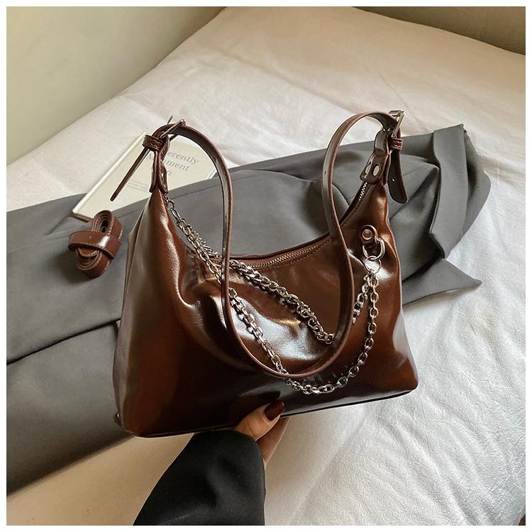 Winter new casual soft bag fashionable simple fashion chain armpit bag high value small square bag коричневий
Winter new casual soft bag fashionable simple fashion chain armpit bag high value small square bag коричневий