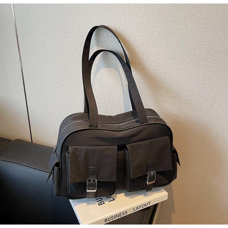 New handbag large-capacity nylon cloth bag women s tote bag solid color multi-bag underarm shoulder bag чорний
New handbag large-capacity nylon cloth bag women s tote bag solid color multi-bag underarm shoulder bag чорний