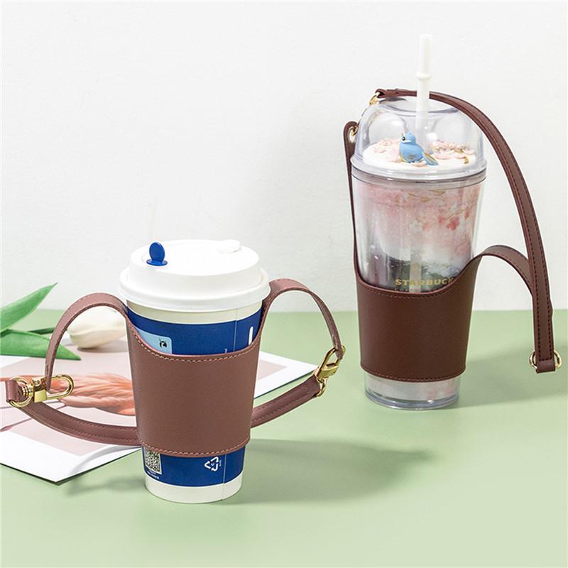 Pu Leather Water Cup Cover Lanyard Portable Water Cup Accessories Hot And Cold Insulation Fashion Quilt Cover бежевый
Pu Leather Water Cup Cover Lanyard Portable Water Cup Accessories Hot And Cold Insulation Fashion Quilt Cover бежевый