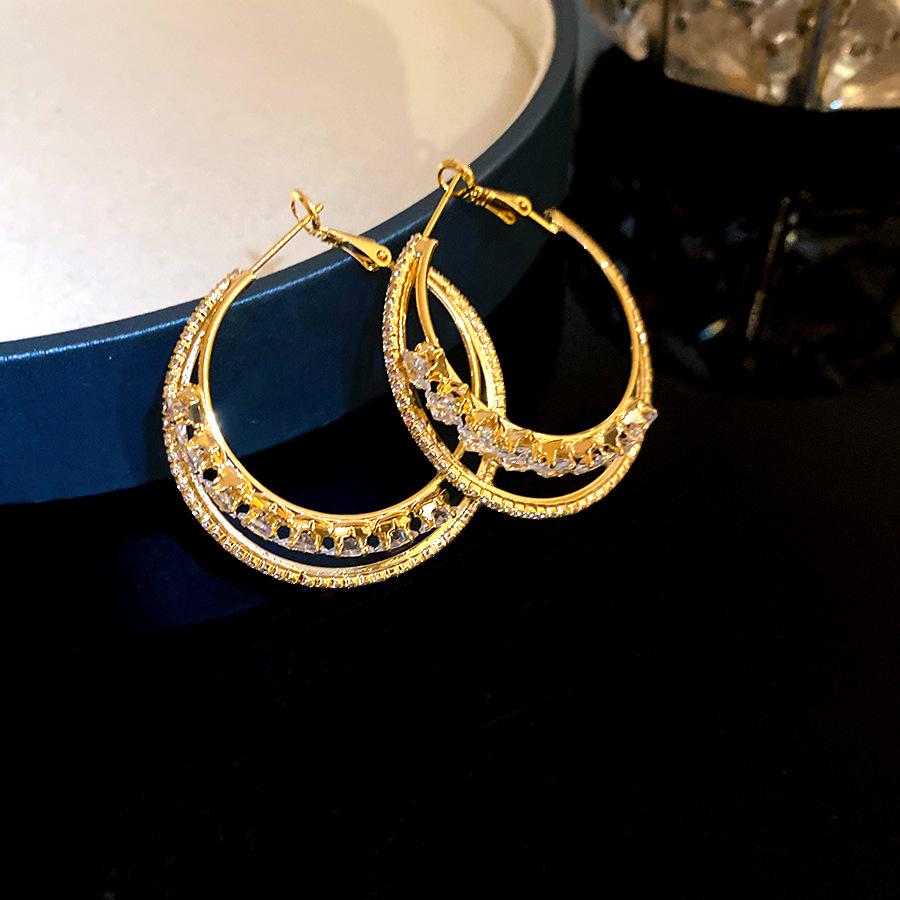 Real gold electroplated silver needle zircon round double-layer earrings niche design earrings light luxury high-end earrings women
Real gold electroplated silver needle zircon round double-layer earrings niche design earrings light luxury high-end earrings women
