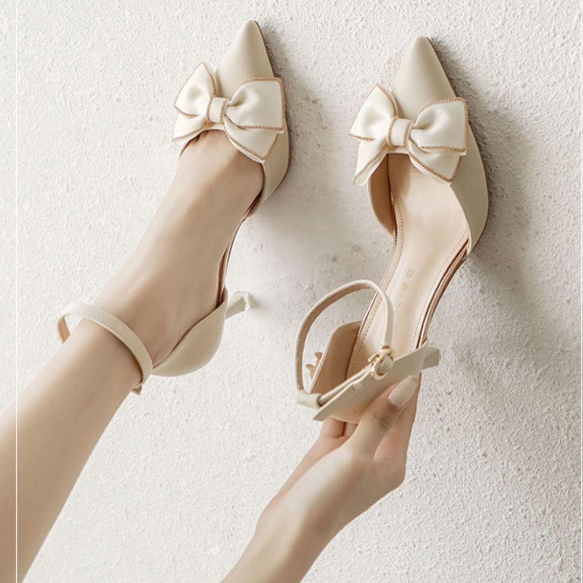 Thin heel hollow fairy single shoes summer new niche design bow word buckle strap high heels women 34
Thin heel hollow fairy single shoes summer new niche design bow word buckle strap high heels women 34