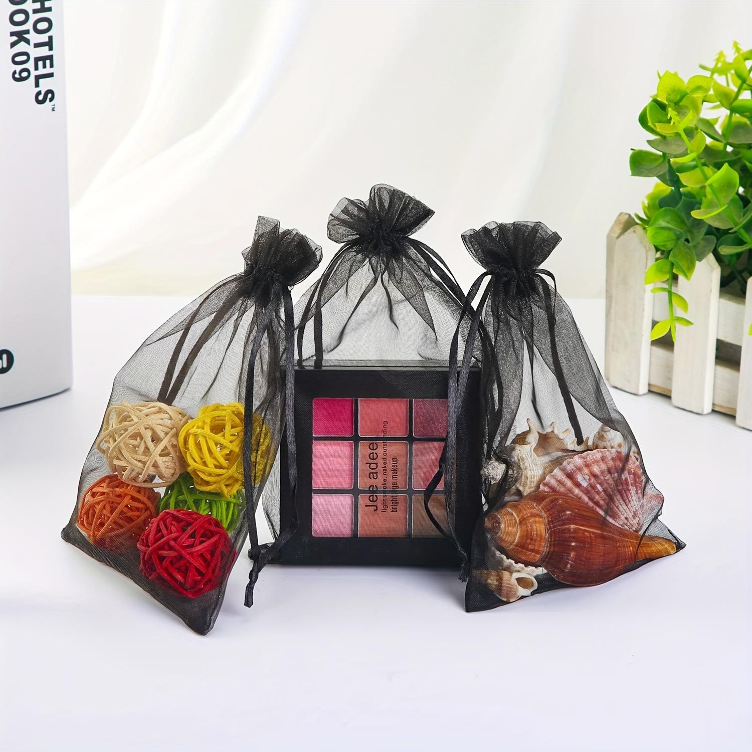 1set 100pcs Organza Drawstring Bags 10x15cm Black Clear Wedding Favors Jewelry Candy Gift Packaging Pack of 100
1set 100pcs Organza Drawstring Bags 10x15cm Black Clear Wedding Favors Jewelry Candy Gift Packaging Pack of 100
