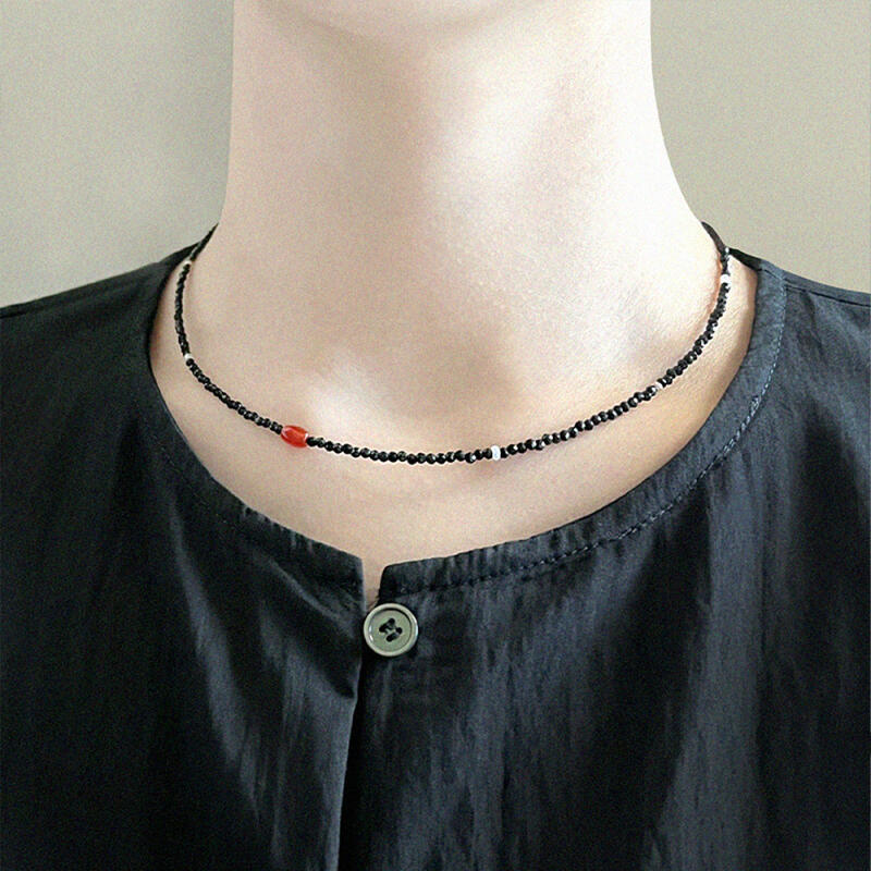 Jamano with black necklace
Jamano with black necklace